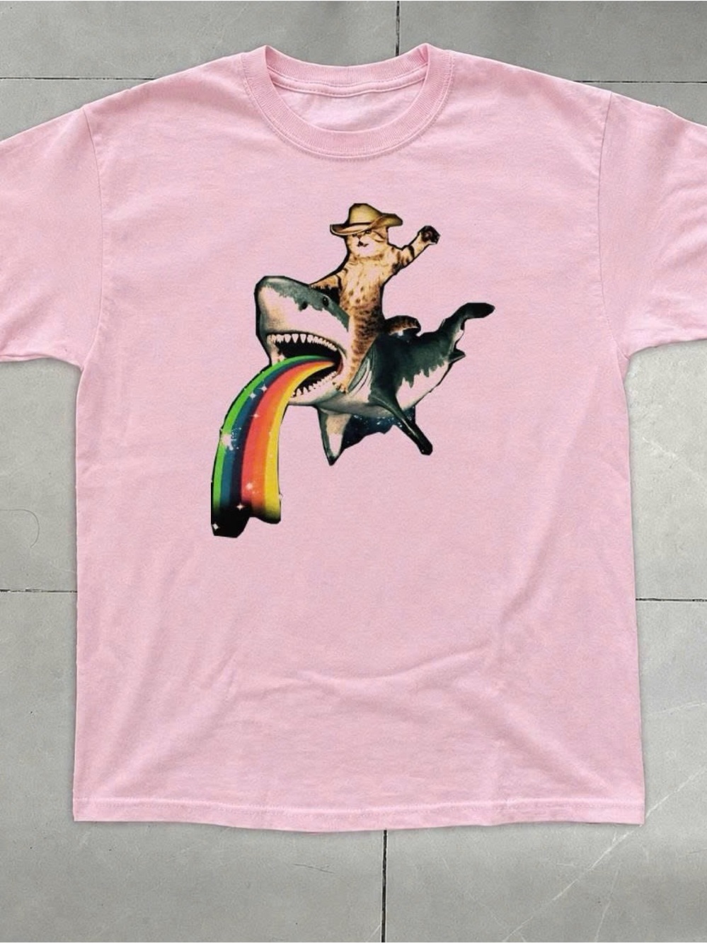 Pink Tee with Cat Cowboy Riding Shark and Rainbow Graphic